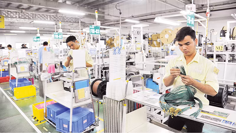 Cần có giải pháp quyết liệt hướng tín dụng chảy vào lĩnh vực sản xuất, kinh doanh. Ảnh | Trần Hải