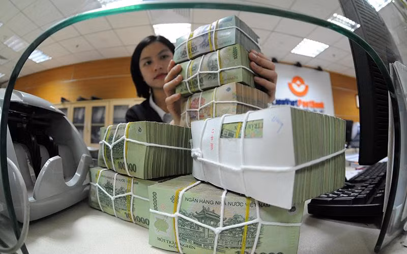 Hoàn thiện hành lang pháp lý cho xử lý nợ xấu. (Ảnh: TRẦN HẢI)