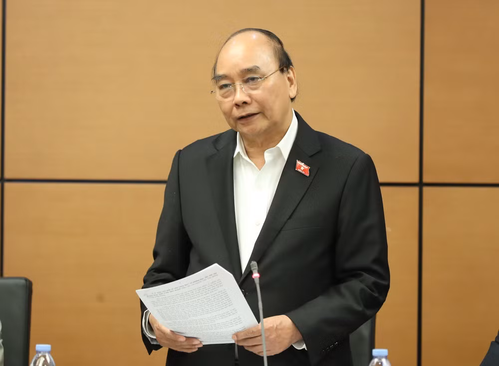 Chủ tịch nước Nguyễn Xuân Phúc góp ý kiến vào dự thảo Quy hoạch tổng thể quốc gia trong phiên thảo luận ở tổ, sáng 6/1.