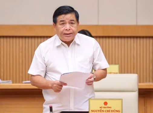 Bộ trưởng Kế hoạch và Đầu tư Nguyễn Chí Dũng báo cáo tại hội nghị. Bộ trưởng Kế hoạch và Đầu tư Nguyễn Chí Dũng báo cáo tại hội nghị.