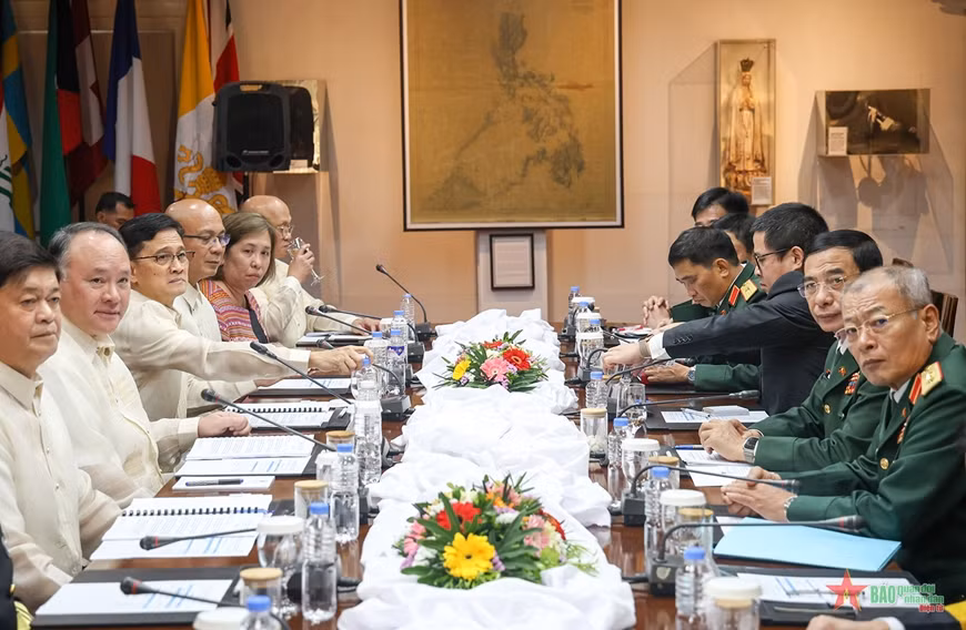 Quang cảnh hội đàm. (Ảnh: Báo Quân đội nhân dân) Quang cảnh hội đàm. (Ảnh: Báo Quân đội nhân dân)