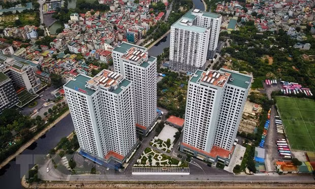 Dư thừa nguồn cung phân khúc cao cấp, thiếu hụt căn hộ giá rẻ, nhà ở xã hội… đang là vấn đề đặt ra. Ảnh: TTXVN