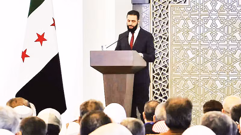 Tổng thống lâm thời Syria phát biểu tại hội nghị đối thoại quốc gia. 