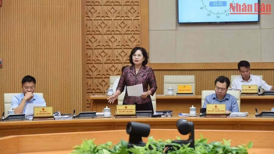 Thống đốc Ngân hàng Nhà nước Nguyễn Thị Hồng phát biểu. (Ảnh: TRẦN HẢI) Thống đốc Ngân hàng Nhà nước Nguyễn Thị Hồng phát biểu. (Ảnh: TRẦN HẢI)