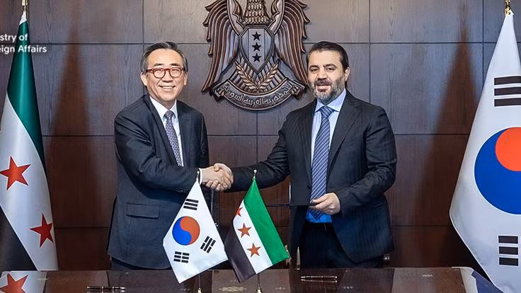 Ngoại trưởng Hàn Quốc Cho Tae-yul (bên trái) và người đồng cấp Syria Asaad Hassan al-Shibani. (Nguồn: Bộ Ngoại giao Hàn Quốc)