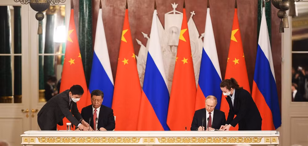 Tổng thống Nga Vladimir Putin và Tổng Bí thư, Chủ tịch Trung Quốc Tập Cận Bình tại Lễ ký các văn kiện chung. (Ảnh: RIA Novosti)
