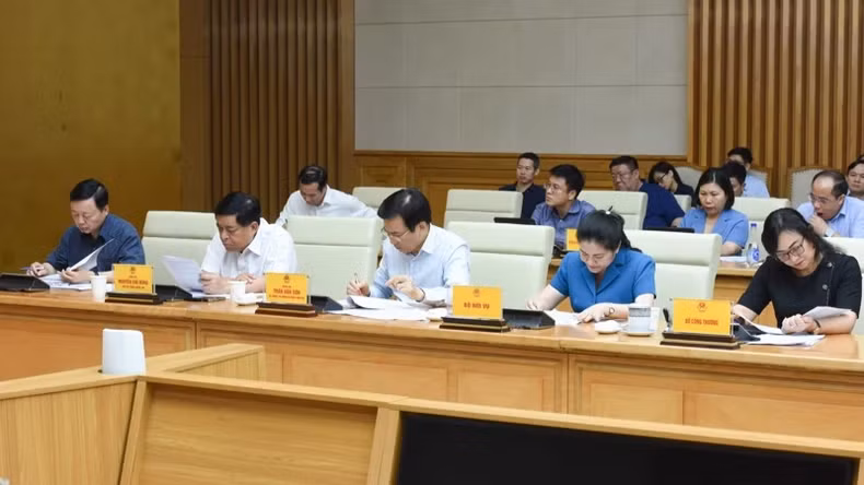 Các đại biểu tham dự cuộc làm việc. (Ảnh: TRẦN HẢI)