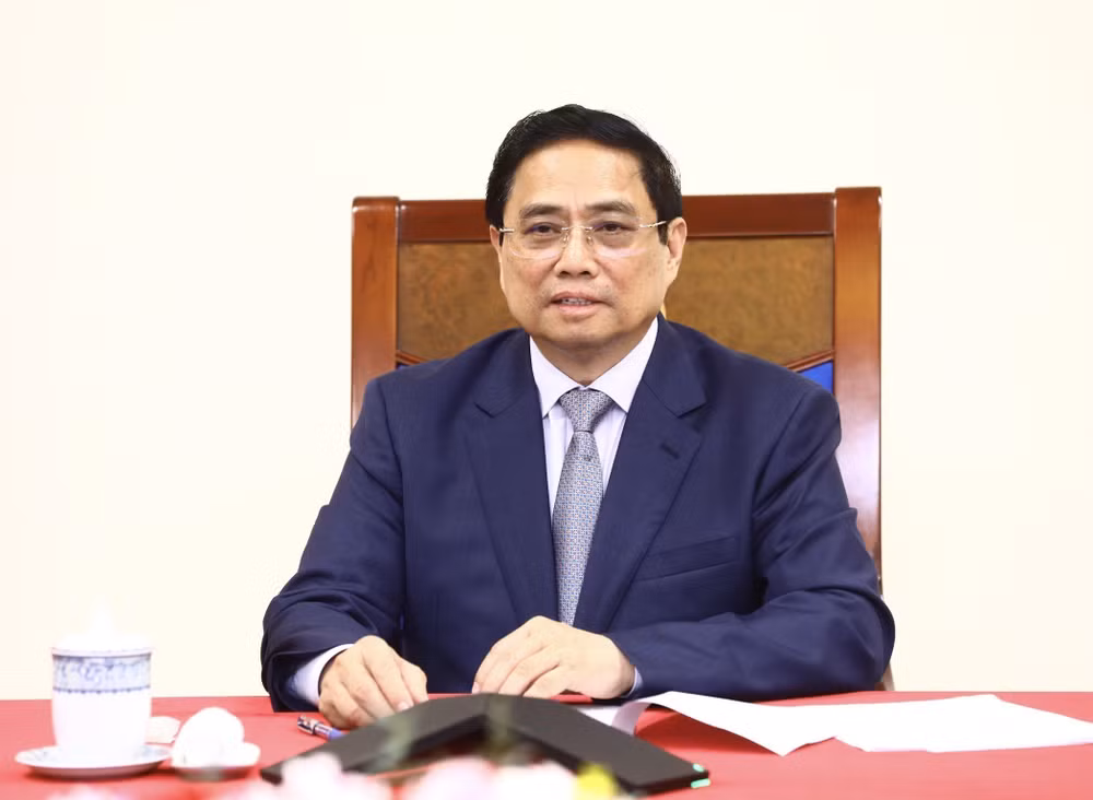 Thủ tướng Phạm Minh Chính điện đàm với Thủ tướng Trung Quốc Lý Cường. (Ảnh: TTXVN)