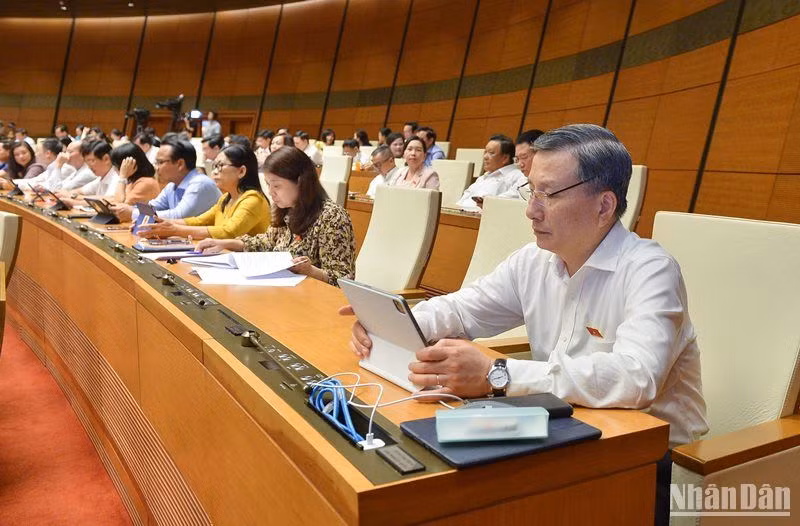 Các đại biểu tham dự phiên họp của Quốc hội sáng 7/6. (Ảnh: THỦY NGUYÊN)