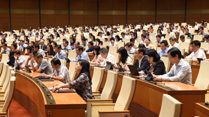 Các đại biểu tham dự phiên họp. (Ảnh: BÙI GIANG) Các đại biểu tham dự phiên họp. (Ảnh: BÙI GIANG)