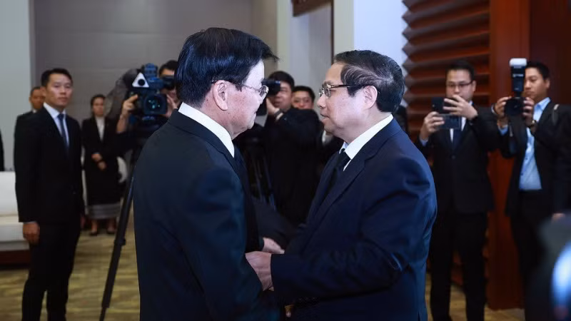 Thủ tướng Phạm Minh Chính gặp Tổng Bí thư, Chủ tịch nước CHDCND Lào Thongloun Sisoulith. (Ảnh: DƯƠNG GIANG/TTXVN)