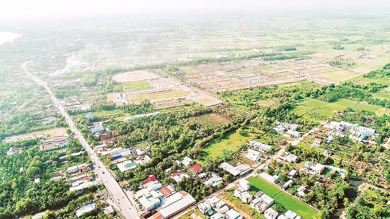 Thuế chuyển mục đích sử dụng đất sẽ tăng cao nhiều lần nếu áp dụng bảng giá đất điều chỉnh. (Ảnh chụp tại huyện Củ Chi) 