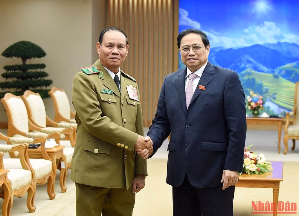 Thủ tướng Phạm Minh Chính tiếp Đại tướng Vilay Lakhamphong, Ủy viên Bộ Chính trị, Phó Thủ tướng, Bộ trưởng Công an Lào. (Ảnh: Trần Hải)
