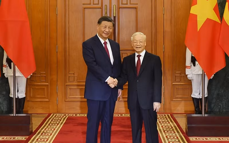Tổng Bí thư Nguyễn Phú Trọng và Tổng Bí thư, Chủ tịch Trung Quốc Tập Cận Bình. (Ảnh: ĐĂNG KHOA)