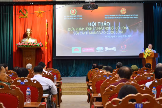 Quang cảnh hội thảo “Đưa Pháp lệnh Ưu đãi người có công với cách mạng vào cuộc sống”. (Ảnh: VŨ MINH)