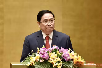 Đồng chí Phạm Minh Chính phát biểu nhậm chức Thủ tướng Chính phủ. Ảnh: TRẦN HẢI