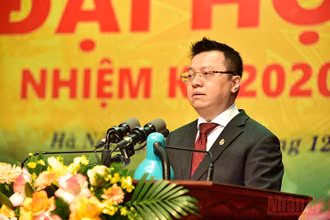 Nhà báo Lê Quốc Minh, Ủy viên Ban Chấp hành Trung ương Đảng, Tổng Biên tập Báo Nhân Dân, Phó Trưởng ban Tuyên giáo Trung ương, Chủ tịch Hội Nhà báo Việt Nam phát biểu khai mạc đại hội. (Ảnh: Thành Đạt)