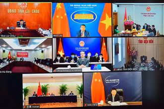 Hội thảo trao đổi trực tuyến Việt Nam-Trung Quốc về kinh nghiệm xóa đói giảm nghèo. Ảnh: BNG
