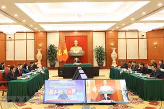 Tổng Bí thư Nguyễn Phú Trọng hội đàm trực tuyến với Chủ tịch Đảng Mặt trận Giải phóng Mozambique (FRELIMO), Tổng thống Mozambique Filipe Jacinto Nyusi. (Ảnh: Trí Dũng/TTXVN)