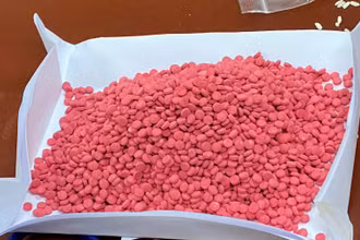 Số viên nén ma túy giấu trong bao gạo.
