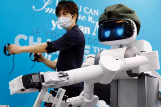 Nhiều cơ hội việc làm của người lao động sẽ bị thay thế bởi máy móc và robot do tác động của đại dịch Covid-19.