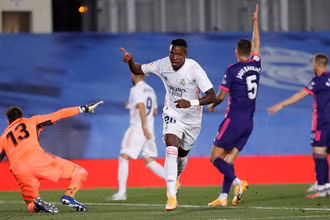 Vinicius ăn mừng bàn thắng duy nhất của trận đấu ở phút 65. (Ảnh: Real Madrid)