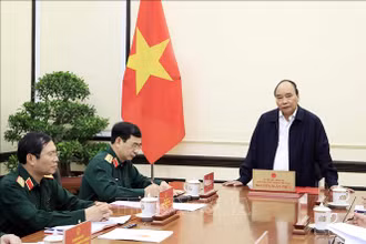 Đồng chí Nguyễn Xuân Phúc, Ủy viên Bộ Chính trị, Chủ tịch nước, Trưởng Ban Chỉ đạo xây dựng Đề án phát biểu. (Ảnh: Thống Nhất/TTXVN)