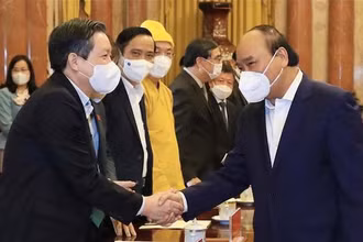 Chủ tịch nước Nguyễn Xuân Phúc với các đại biểu dự hôi nghị. (Ảnh: Thống Nhất/TTXVN)