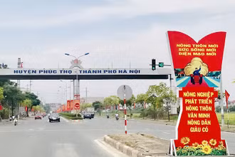 Hạ tầng giao thông tại huyện Phúc Thọ được đầu tư xây dựng khang trang. (ẢNH: QUỐC TOẢN)