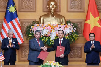 Lễ Trao đổi “Bản ghi nhớ về tuyển dụng, việc làm và hồi hương lao động giữa Chính phủ nước CHXNCN Việt Nam và Chính phủ Malaysia”.