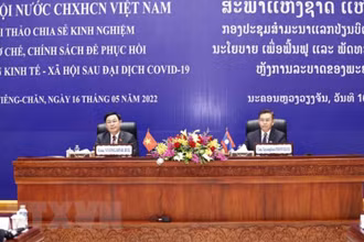 Chủ tịch Quốc hội Vương Đình Huệ và Chủ tịch Quốc hội Lào Saysomphone Phomvihane đồng chủ trì Hội thảo.