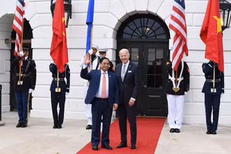 Thủ tướng Phạm Minh Chính và Tổng thống Hoa Kỳ Joe Biden. (Ảnh: DƯƠNG GIANG/TTXVN)