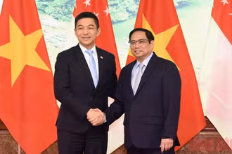 Thủ tướng Phạm Minh Chính và Chủ tịch Quốc hội Singapore Tan Chuan-Jin.