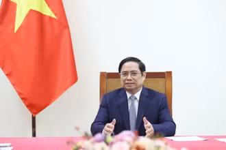 Thủ tướng Phạm Minh Chính điện đàm với ông John Kerry, đặc phái viên của Tổng thống Hoa Kỳ. (Ảnh: Dương Giang/TTXVN)
