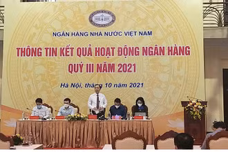 Phó Thống đốc Thường trực NHNN Đào Minh Tú phát biểu tại cuộc họp báo.