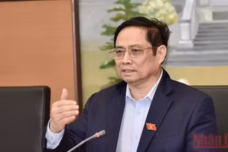 Thủ tướng Chính phủ Phạm Minh Chính phát biểu tại phiên thảo luận tổ, ngày 21/10. Ảnh: Linh Bắc