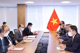 Chủ tịch nước Nguyễn Xuân Phúc tiếp Tập đoàn Macquaire, JP Morgan, Bechtel, GE, McDermontt. (Ảnh: Thống Nhất/TTXVN)