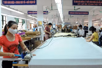Sản xuất tại công ty may Đáp Cầu (Bắc Ninh). (Ảnh: Thanh Hải)