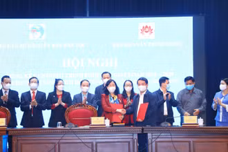 Quang cảnh lễ ký kết giữa hai cơ quan.
