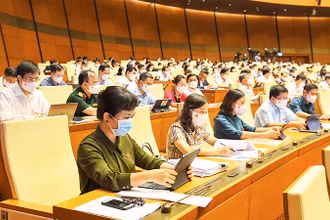 Các đại biểu Quốc hội dự phiên họp toàn thể tại hội trường. Ảnh: QUANG HOÀNG 