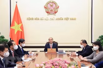 Chủ tịch nước Nguyễn Xuân Phúc điện đàm với Tổng thống Romania Klaus Werner Iohannis. (Ảnh: TTXVN)