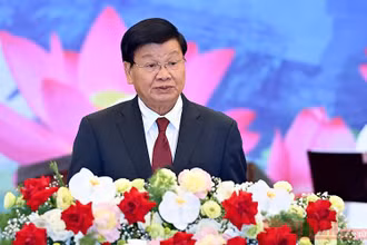 Tổng Bí thư, Chủ tịch nước Lào Thongloun Sisoulith đọc diễn văn đáp từ. Ảnh: Đăng Khoa.