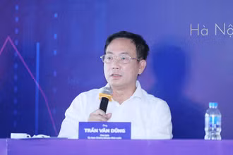 Chủ tịch Ủy ban Chứng khoán Nhà nước Trần Văn Dũng chia sẻ tại Tọa đàm “Nghẽn lệnh HoSE: Thực trạng và Giải pháp” tổ chức ngày 24-6. (Ảnh: Quang Phúc)