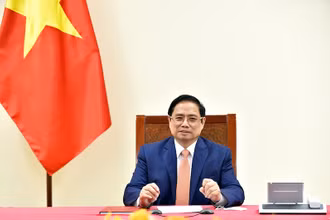 Thủ tướng Phạm Minh Chính điện đàm với Thủ tướng Đức Angela Merkel. Ảnh: NHẬT BẮC