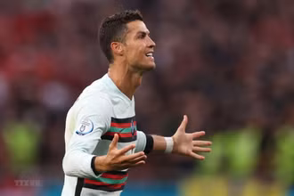 Ronaldo lập nhiều kỷ lục trong ngày ra quân ở EURO 2020. (Ảnh: AFP/TTXVN)