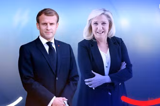 Hai ứng cử viên lọt vào vòng hai bầu cử tổng thống Pháp: ông Emmanuel Macron và bà Marine Le Pen. Ảnh: BFMTV.