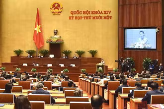 Chủ tịch Quốc hội Nguyễn Thị Kim Ngân trình bày Báo cáo Công tác nhiệm kỳ khoá XIV của Quốc hội, sáng 24-3 (Ảnh: TRẦN HẢI)