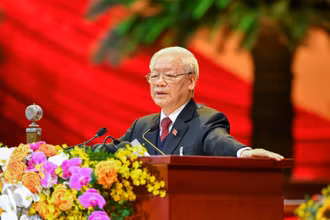 Đồng chí Nguyễn Phú Trọng, Tổng Bí thư, Chủ tịch nước đọc Báo cáo của Ban Chấp hành Trung ương khóa XII về các văn kiện Đại hội XIII của Đảng.