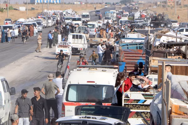 Người tị nạn Syria trở về nhà ở thành phố Ras al-Ain, ngày 10/8/2026. (Ảnh: THX/TTXVN phát)