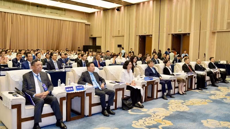 Đại biểu tỉnh Quảng Ninh và Khu tự trị dân tộc Choang Quảng Tây dự hội nghị. (Ảnh: QMG)